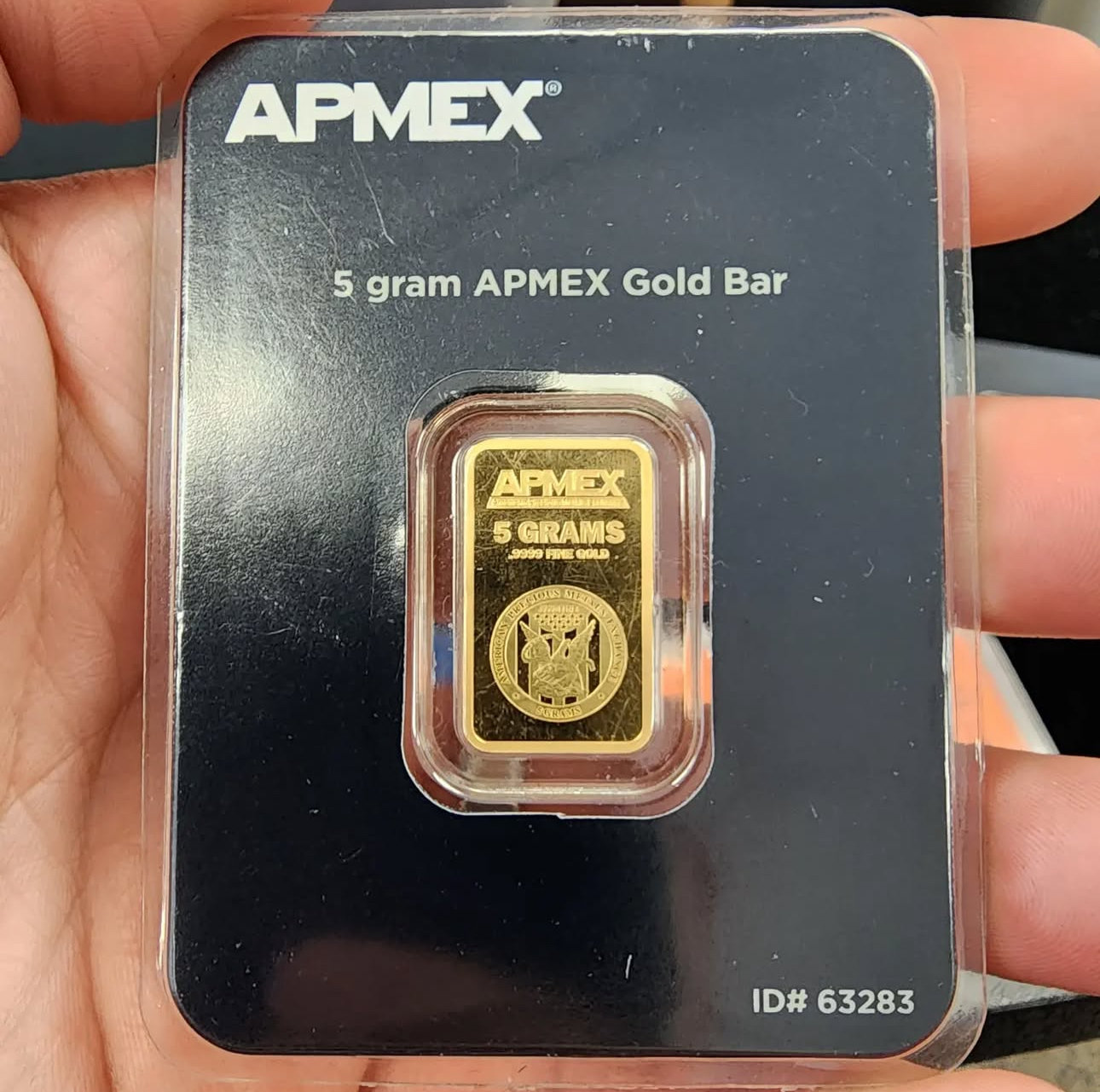 5 grams Gold APMEX bar.